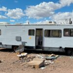 Old RV Hauling to Dump Site