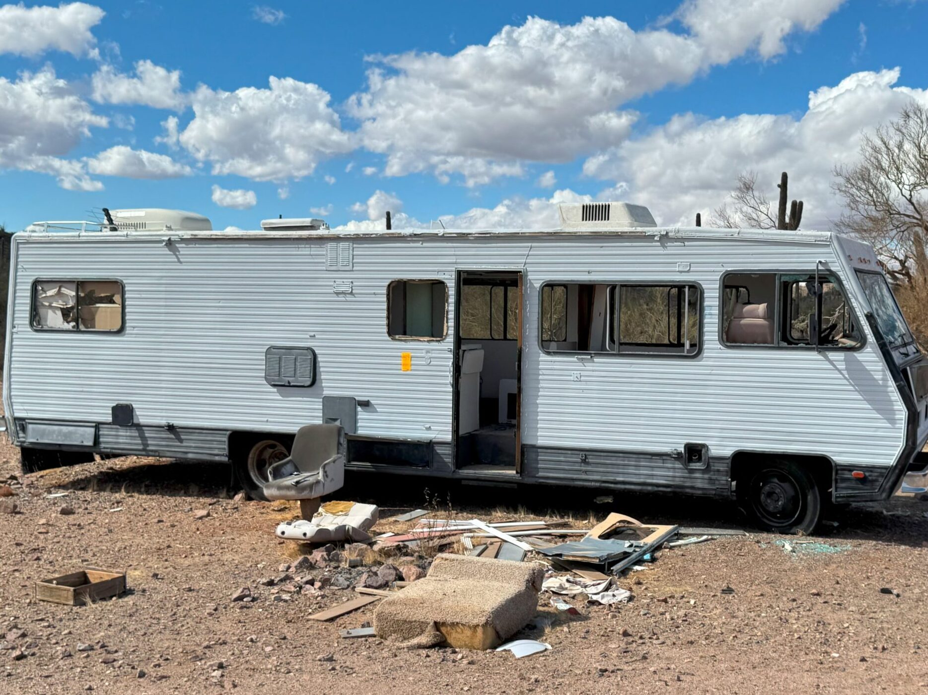 Old RV Hauling to Dump Site